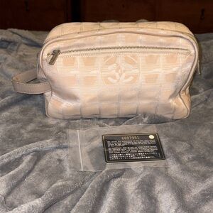 Chanel travel line Beige Checkered zippy pouch bag with Chanel COA card